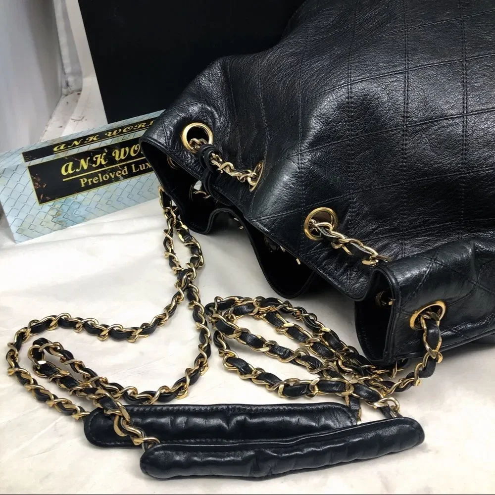Vintage Chanel Black Lambskin Quilted CC Drawstring Bucket Bag Leather Backpack